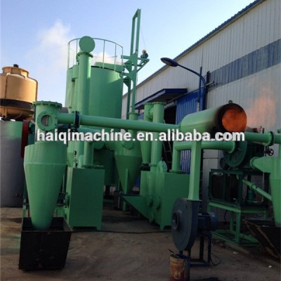 Wood branches pyrolysis gasifier furnace to produce biogas (tree limb or white pine gasification for burning gas)